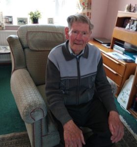 Richard Hendy, sitting in his armchair