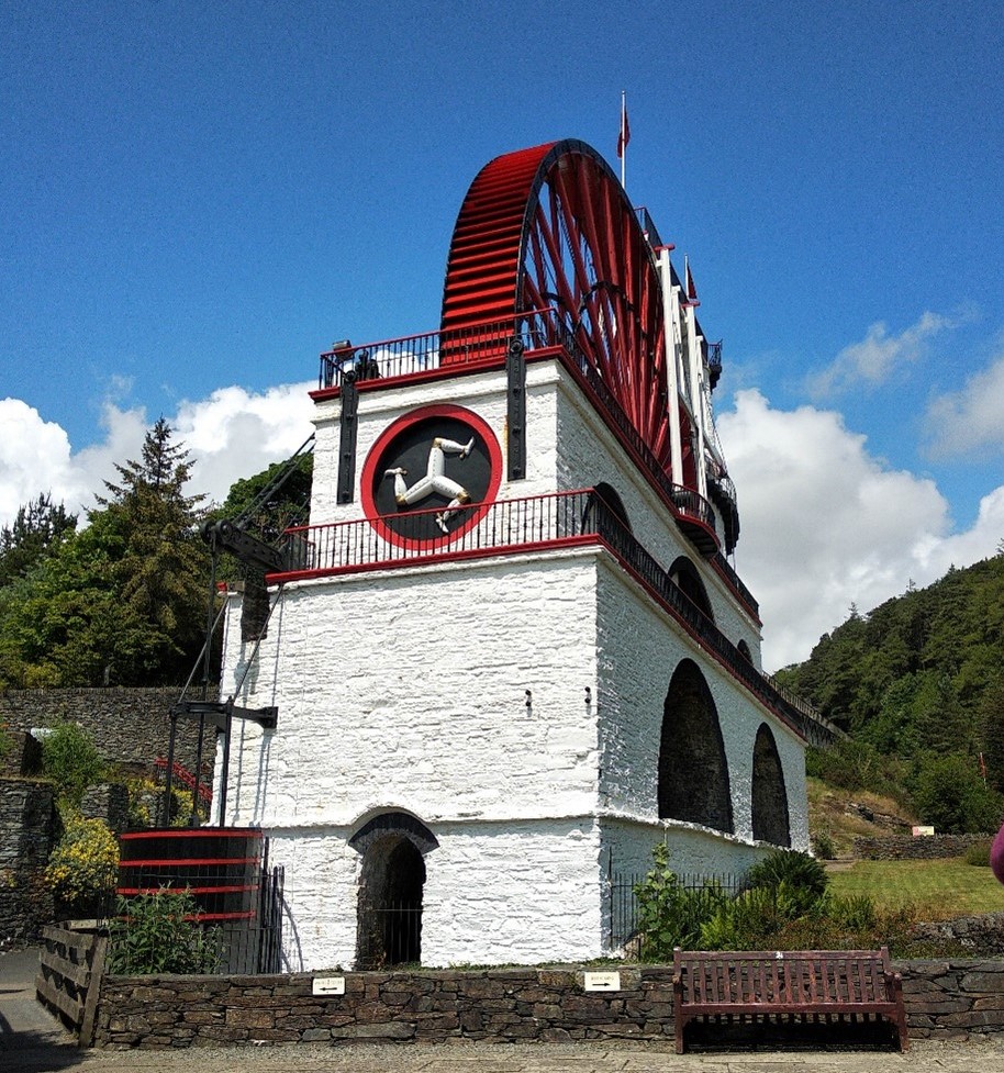 The Laxey Wheel with a blue sky behind